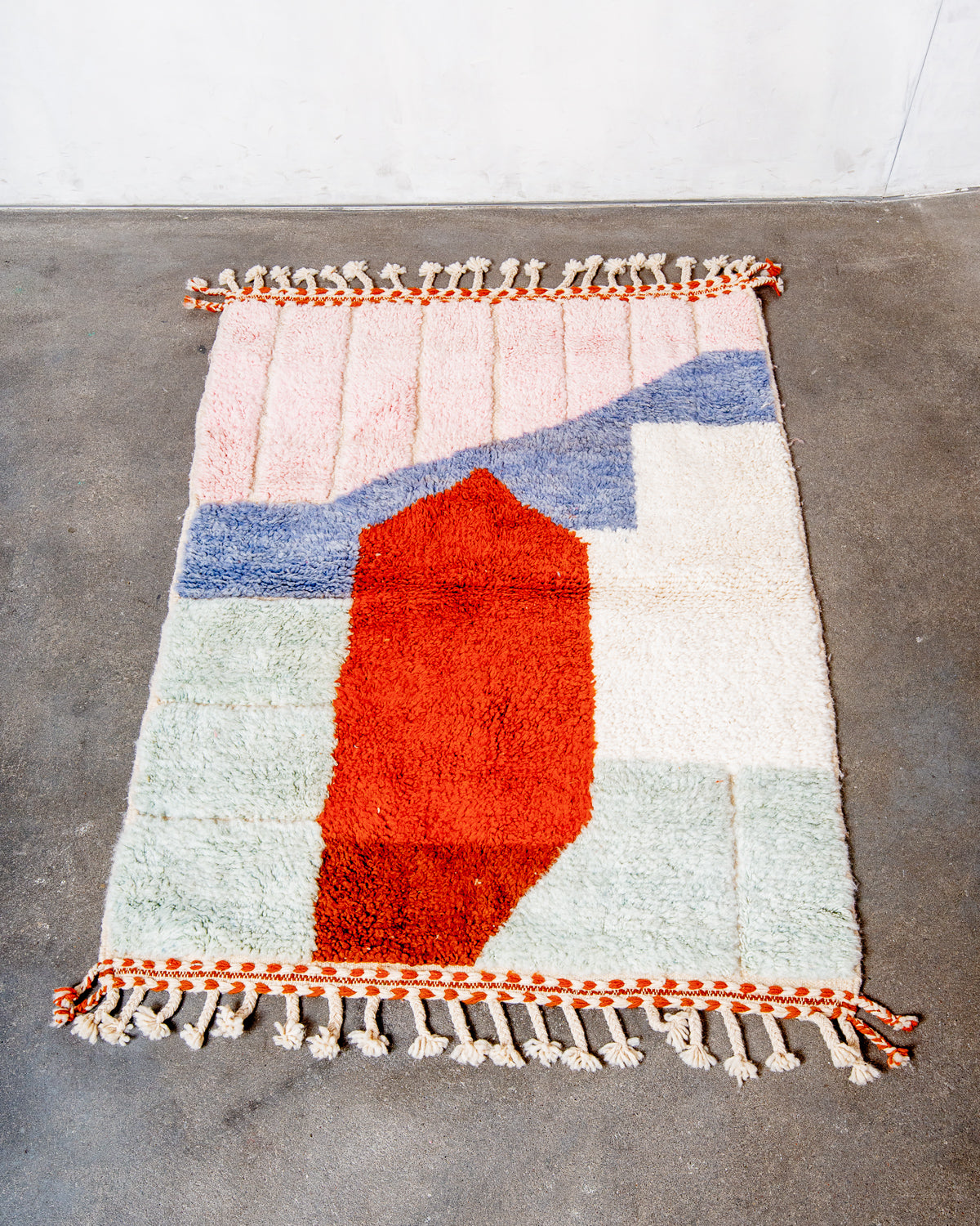 Modern, designer, handcrafted Berber rug from Morocco. Beniourain carpet with beautiful colours and patterns and fluffy wool texture.